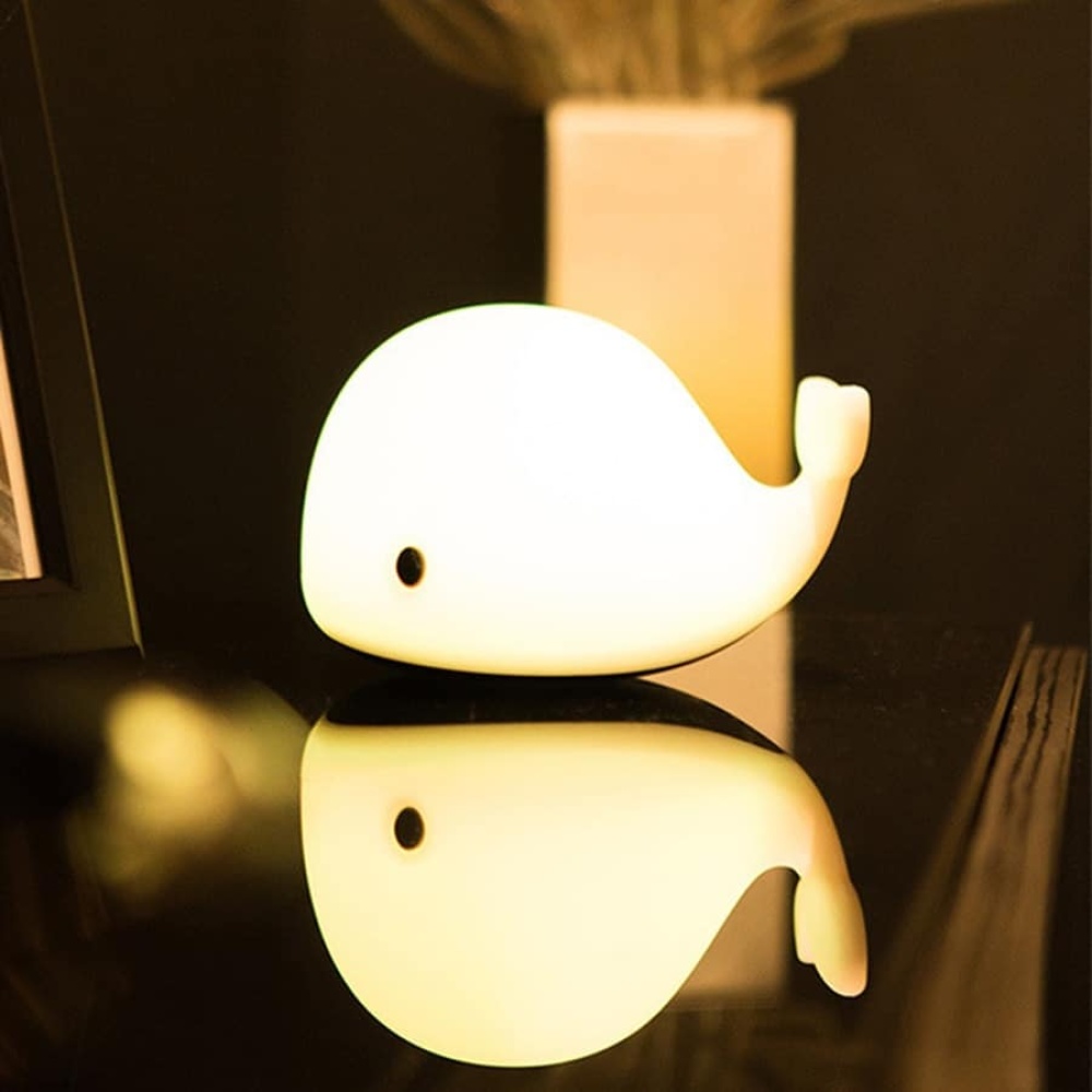 Lampada da comodino a LED a forma di balena luminosa con occhi neri