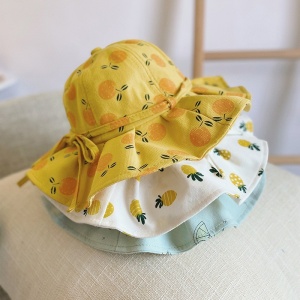 Cappello da bambina con motivo di ananas giallo, bianco e blu