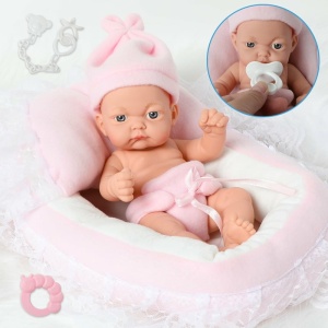 Bambola neonata con cuscino rosa e bianco