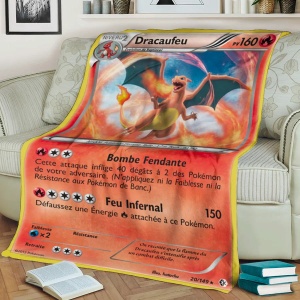 Coperta con carta arancione Pokémon Firecracker per bambini su un divano con libri