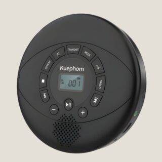Lecteur CD avec haut-parleur noir sur fond beige